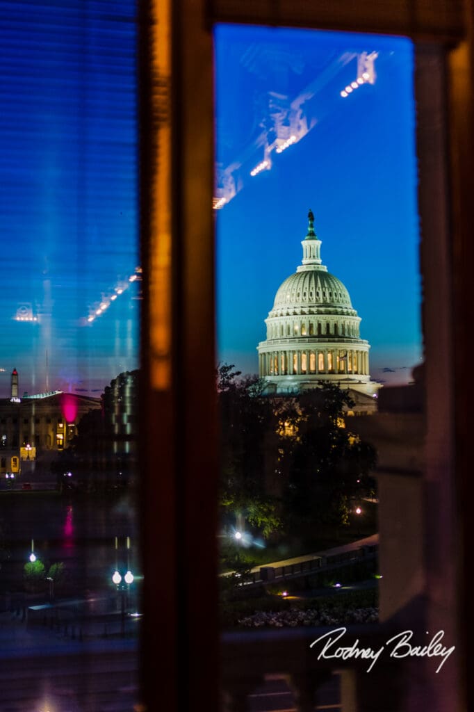 A view of the capitol building from an apartment window.